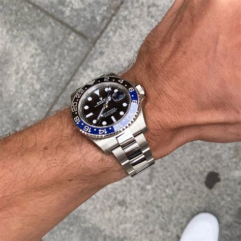 wearing Rolex Batman gmt